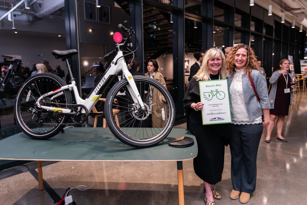 Electric Bike winner Mary O'Donoghue with sponsor Angela Aeschliman from Missner Group